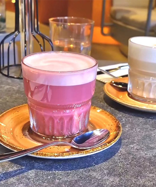 Tumbler with Orange Craft Saucer Supplied by Roneford Catering